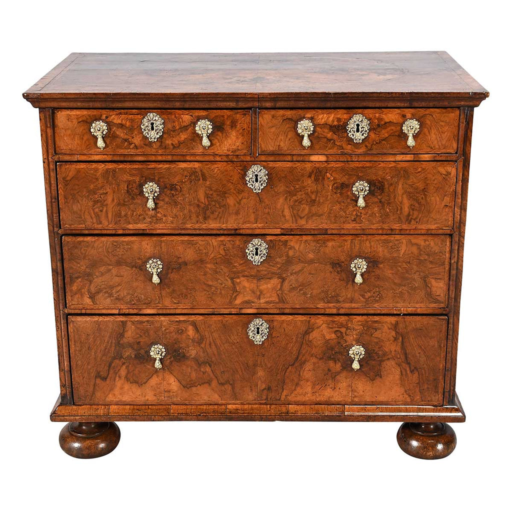 A George I Period Chest Veneered in Highly Figured Walnut