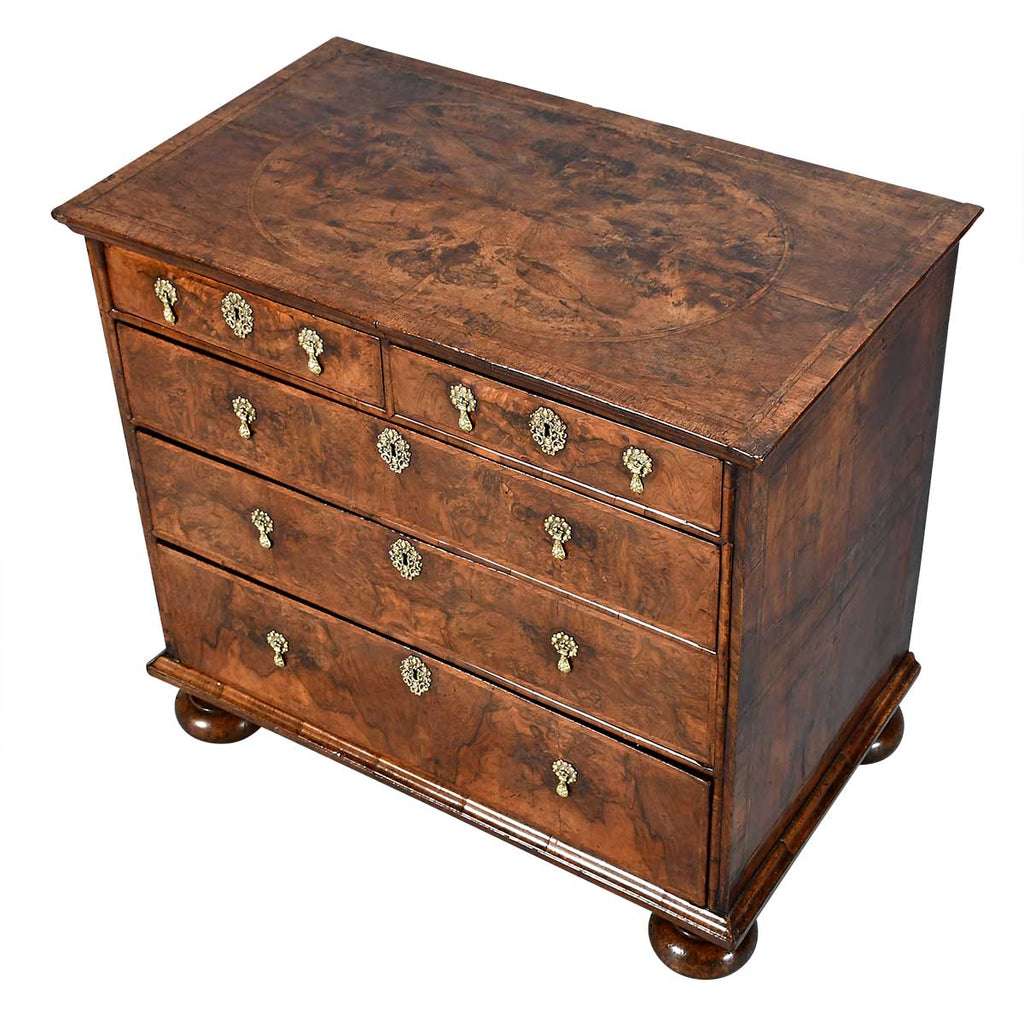 A George I Period Chest Veneered in Highly Figured Walnut