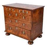 A George I Period Chest Veneered in Highly Figured Walnut
