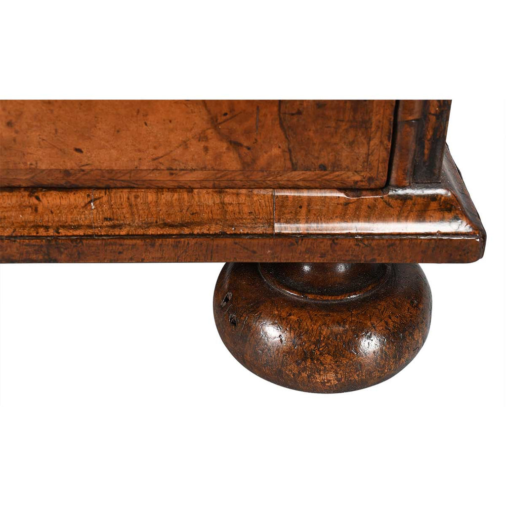 A George I Period Chest Veneered in Highly Figured Walnut