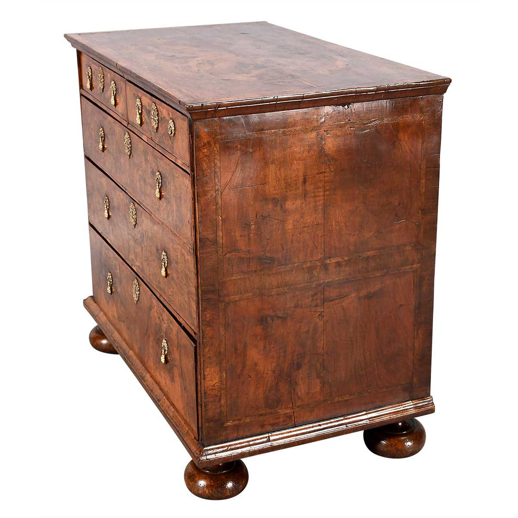 A George I Period Chest Veneered in Highly Figured Walnut