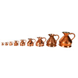 Collection of Nine Copper 'Haystack' Measures