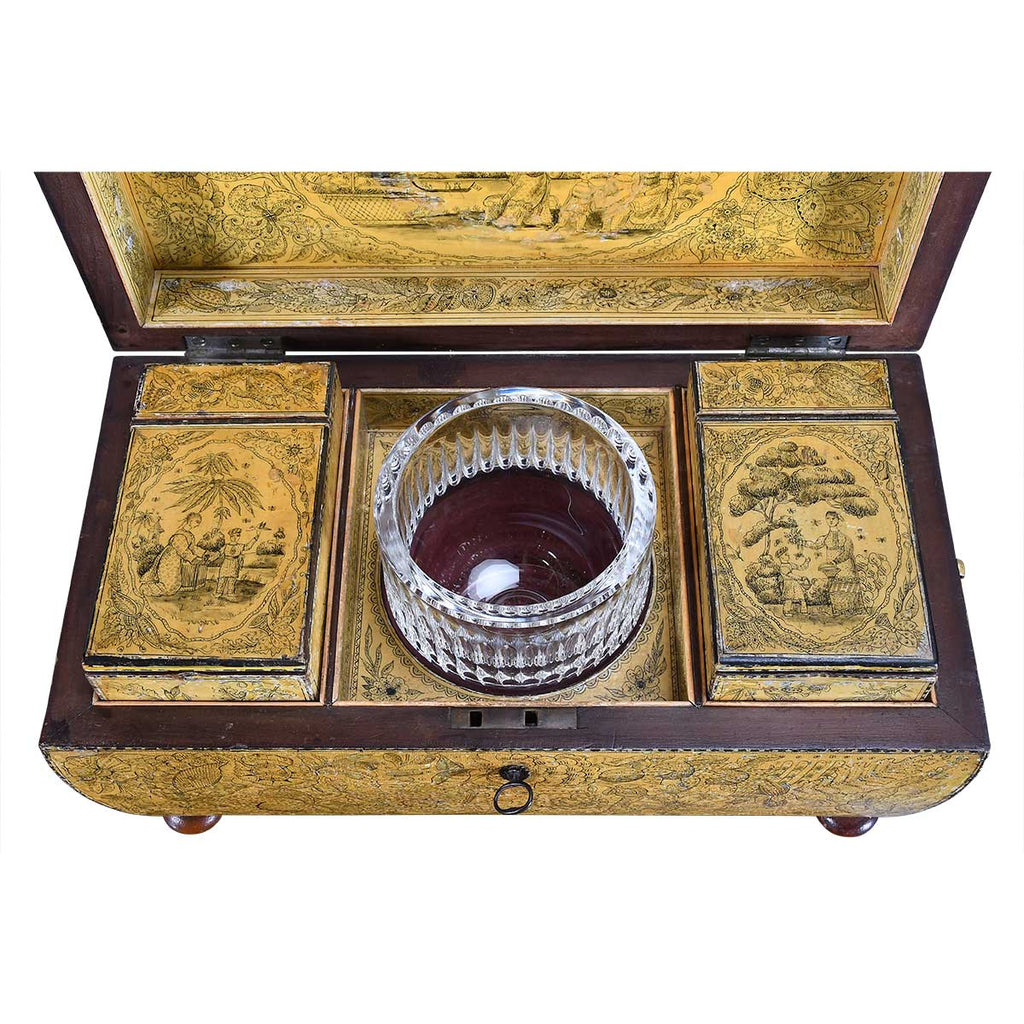 A Regency Period Penwork Tea Caddy with Unusual Ground Color