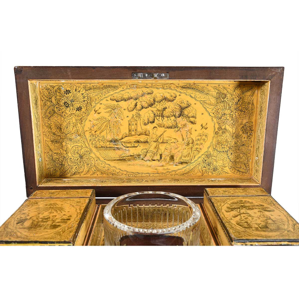 A Regency Period Penwork Tea Caddy with Unusual Ground Color