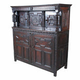 A 17th century antique English oak court cupboard. view 1