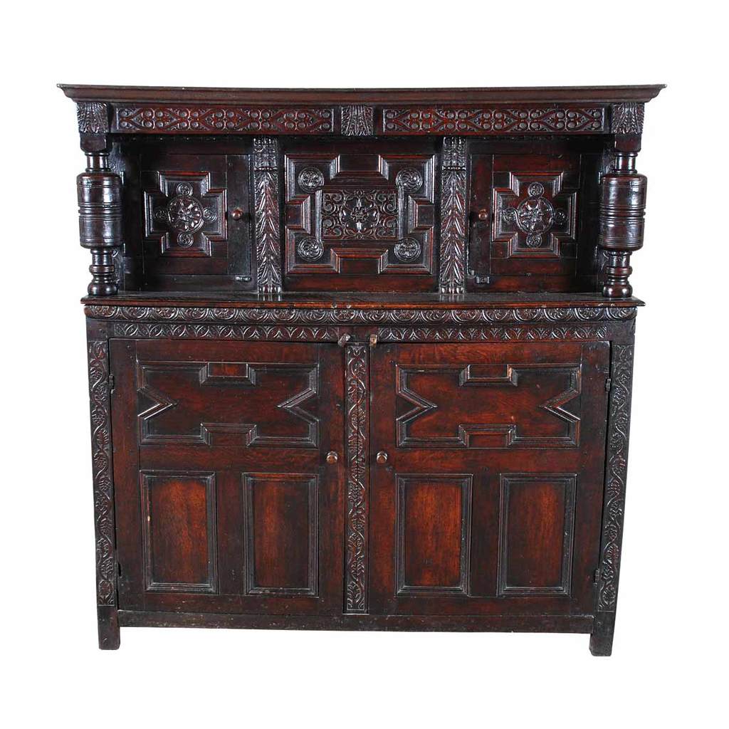 A 17th century antique English oak court cupboard. view 2
