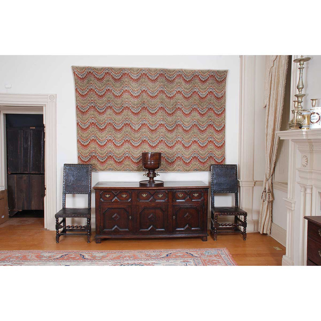 A Pair of Leather-Covered Hall Chairs