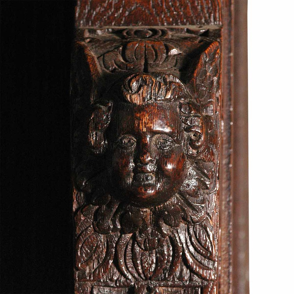 A 17th century oak Flemish guild cupboard. view 2