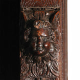 A 17th century oak Flemish guild cupboard. view 2