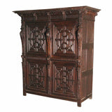 A 17th century oak Flemish guild cupboard. view 1