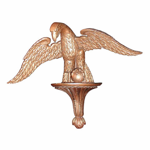 A 19th century carved wood gilded bracket depicting an eagle. view 1