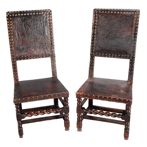 A Pair of Leather-Covered Hall Chairs