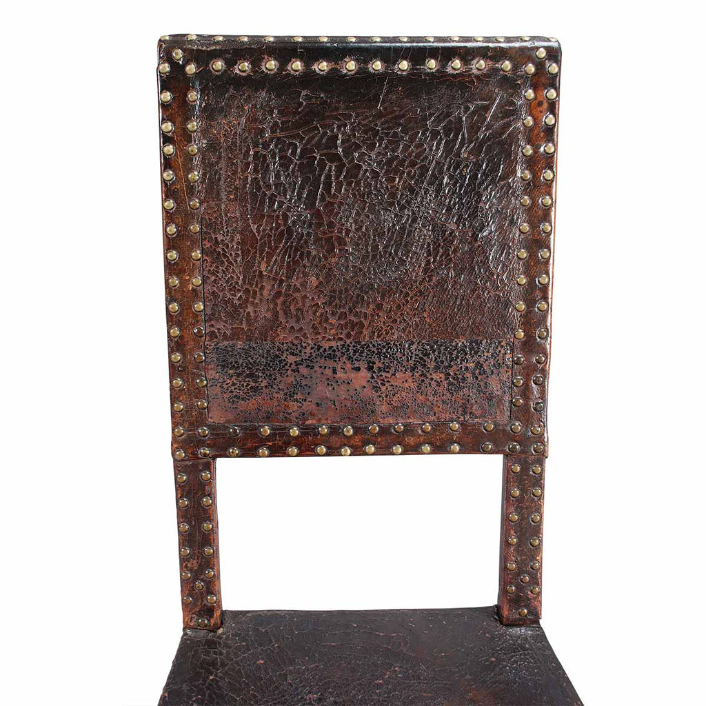 A Pair of Leather-Covered Hall Chairs