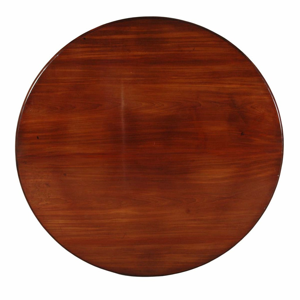 An English mahogany dining table on turned pedestal with four-splay legs. view 3