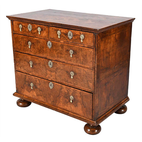 A George I Period Chest Veneered in Highly Figured Walnut