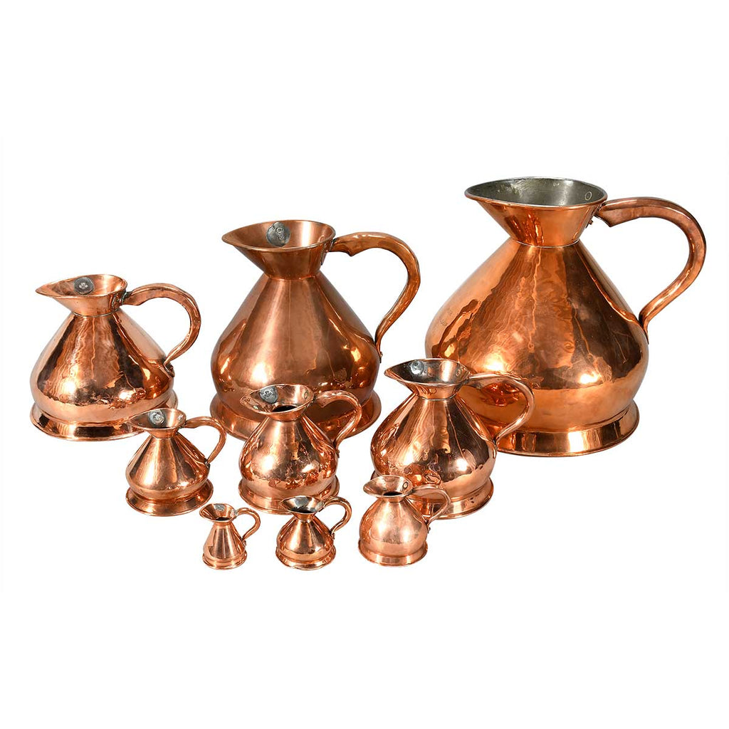 Collection of Nine Copper 'Haystack' Measures