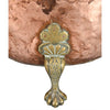 A Large Circular Copper Bin on Brass Paw Feet