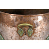 A Large Circular Copper Bin on Brass Paw Feet