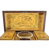 A Regency Period Penwork Tea Caddy with Unusual Ground Color