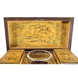 A Regency Period Penwork Tea Caddy with Unusual Ground Color