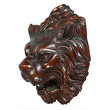 Pair of Carved Lion Masks