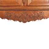 A highly carved 19th century oak armoire. view 4