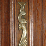 A highly carved 19th century oak armoire. view 2