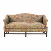 A 19th century George III period sofa of camelback form with rolled arms. view 2