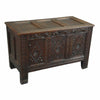 An English oak coffer with three diamond-carved panels across the front and paneled lid. view 1