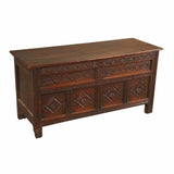 A 18th century highly carved oak coffer. view 1