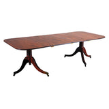 An English mahogany dining table with rounded rectangular top. view 2