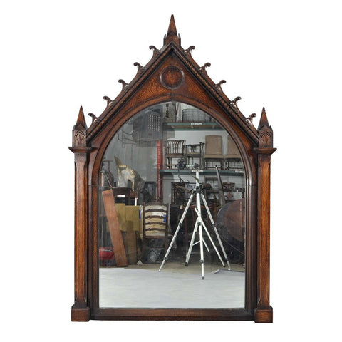 A 19th century large oak Gothic Revival frame from a French church now fitted with a mirror plate. view 1