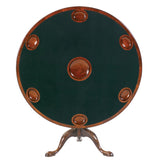 A mahogany games table with acanthus leaf-carved pedestal and money wells in the top. view 2