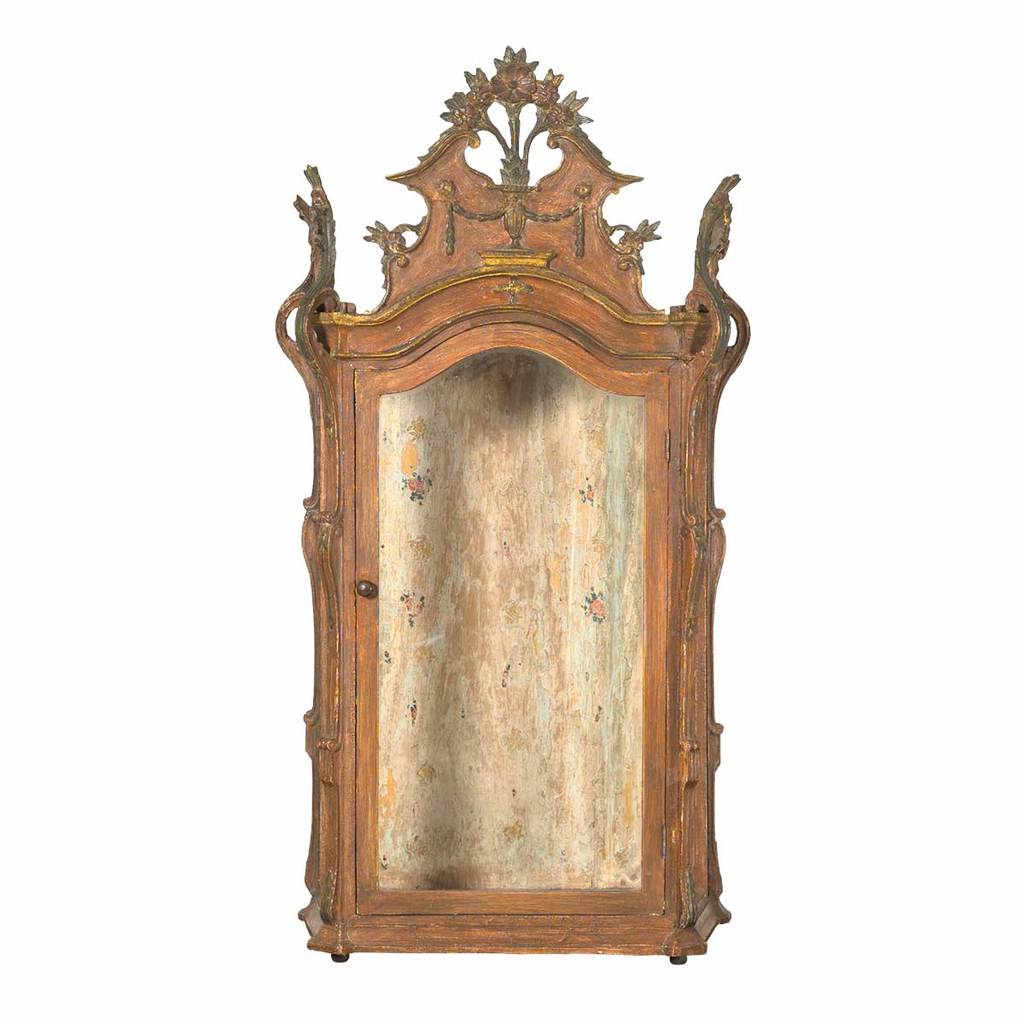 A Portuguese table top or hanging vitrine with elaborate carving and painted surface. view 1