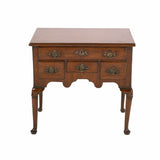 An English mahogany lowboy standing on modified cabriole legs ending in pad feet. view 2