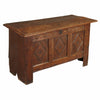 A carved oak coffer with three panels across the front. view 1