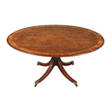 An English oval breakfast table with wide strip of cross-banding and incredible color and patina. view 3