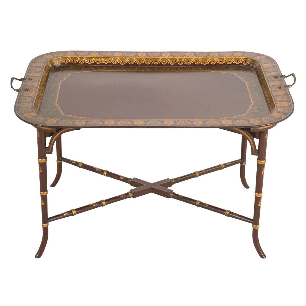 A antique red chinoiserie and gilt tray with the original brass handles. view 1