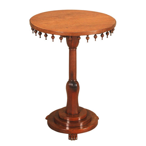 A 19th century Anglo-Indian teak tilt-top table. view 1