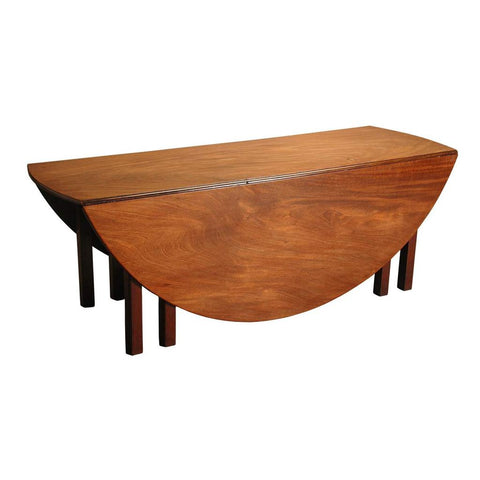 An antique Irish mahogany wake table with highly figured top. view 1