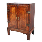 An Early Walnut and Oak Cabinet on Stand
