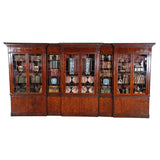 A 18th century extremely long bookcase of double-breakfronted form. view 1